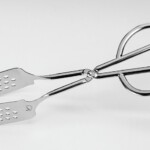 NJOY A650Z STEEL SCISSOR PERFORATED TONGS 26CM